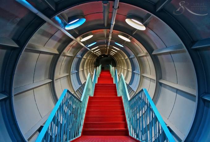 Red stairway through round tunnel by JuanSofia - Tunnels Photo Contest