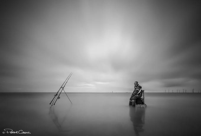 The Beachcaster by petergreig - Negative Space Photo Contest