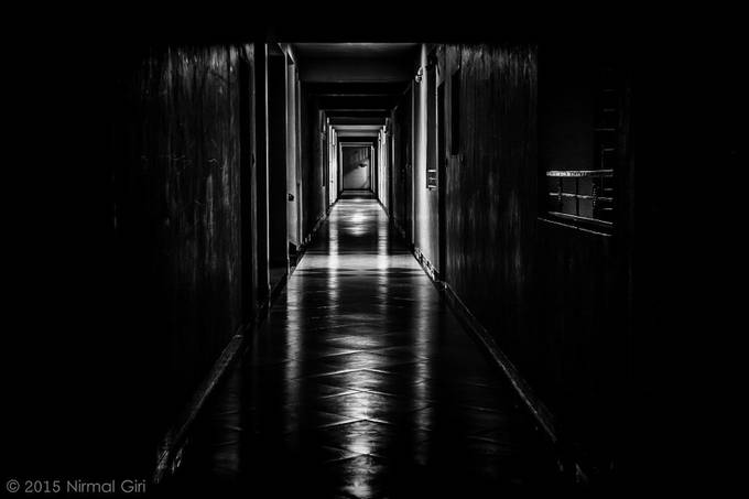 Dark Hallway by NirmalGiri - Black and White Mysteries Photo Contest 