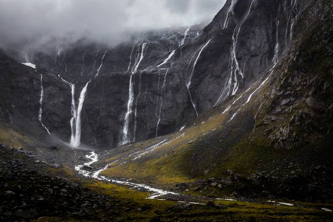 Waterfalls near the mouth of the Homer Tunnel by travisdaldy - Natural Landscapes Photo Contest