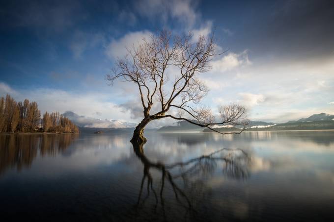 Reflections from the Wanaka Lake by michellemckoy
