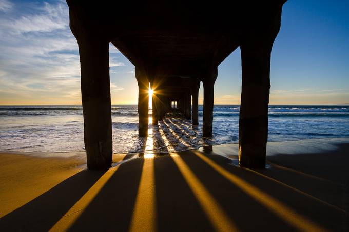 Pier Sun Ray by ShabdroPhoto - The View Under The Pier Photo Contest