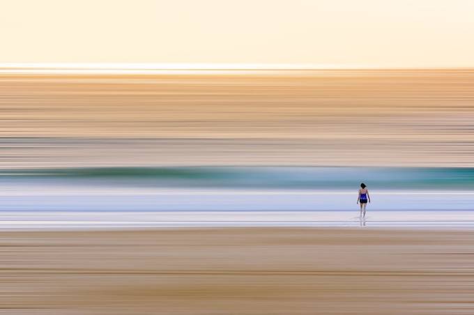 Lone Swimmer Entering Surf at Dawn_P by Toptruck - Show Minimalism Photo Contest