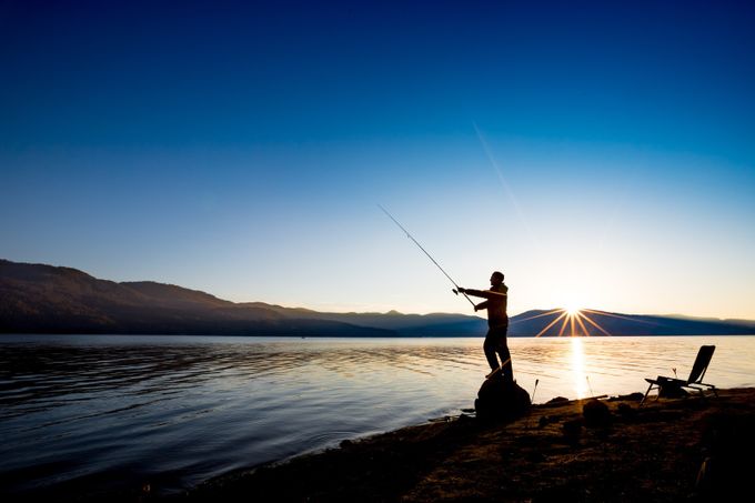 Fishing in the calmness of the morning. Self portrait. by DamianHadjiyvanov - Blue Skies Photo Contest