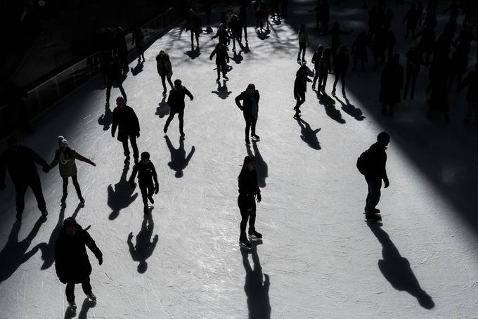 Ice skating by gregblomberg - Shadow Compositions Photo Contest