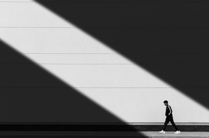 Walk In The Light by Fatehi - Picturing Negative Space Photo Contest