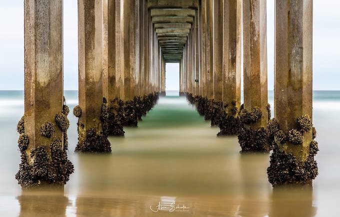 Door Under the Pier by AlexSchulzPhoto - Ocean Piers Photo Contest