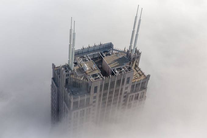 Through the Clouds by fredblurton - Finding Fog In The City Photo Contest