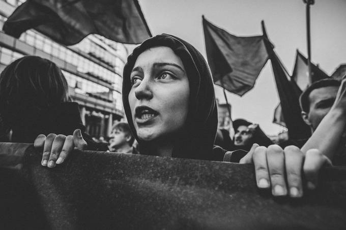 The girl participates in the march of the nationalists by SandurSo - Monochrome Visions Photo Contest