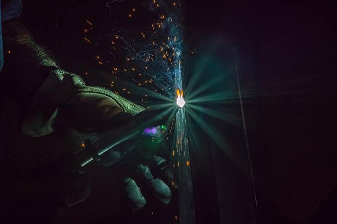 Hanging out with my old man watching him weld. by dvo - Light Streaks Photo Contest
