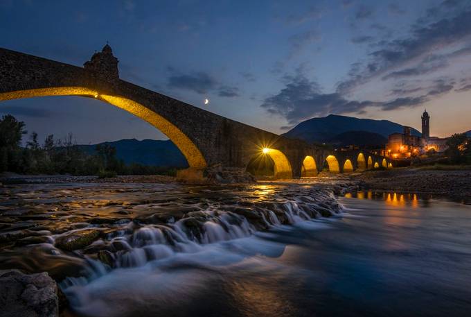 An ancient bridge at sunset by livioferrari - Image Of The Month Photo Contest Vol 73